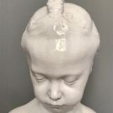 Child bust in enamelled terracotta
