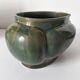 Art Deco flared cache-pot in turquoise glazed earthenware.