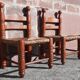 Pair of low armchairs by the fireplace. (Straw seat)