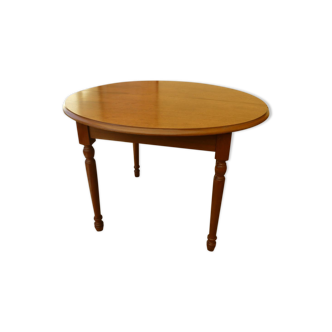 Solid wood round table with retractable extension