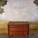 Petite commode époque Louis XVI en merisier