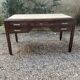 Art Deco desk in varnished mahogany.
