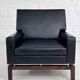 Pair of 50s-60s armchairs in imitation leather, wood and chrome