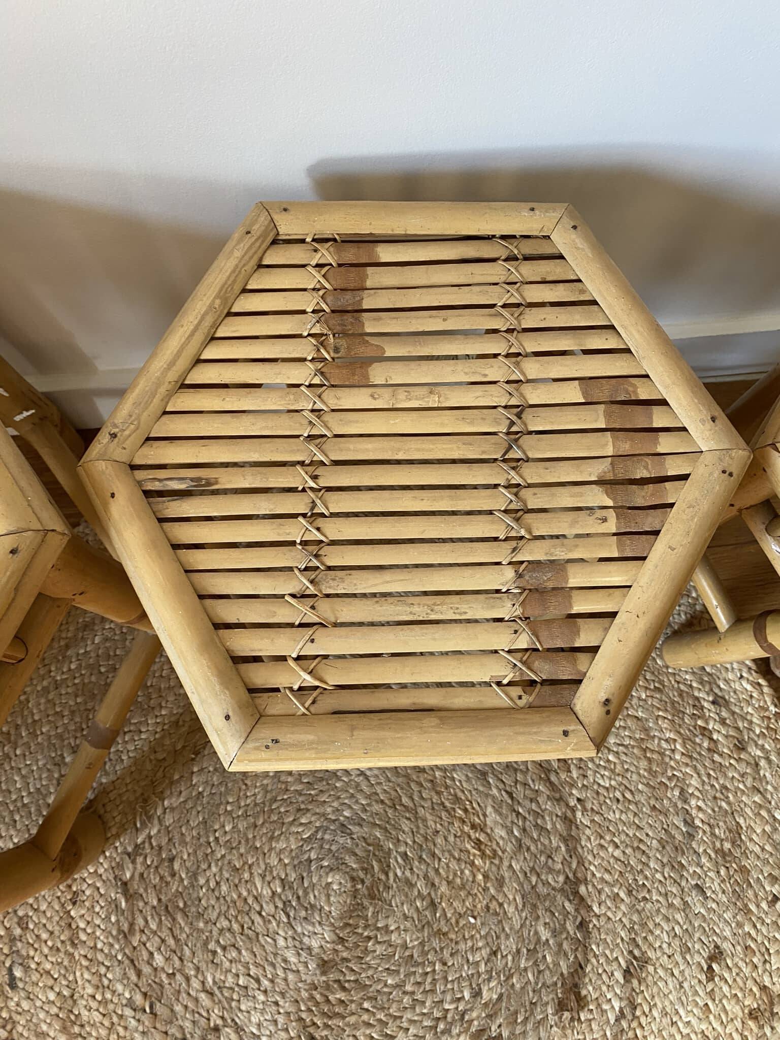 Set of three vintage rattan side tables.