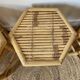 Set of three vintage rattan side tables.