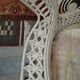 White wicker armchair