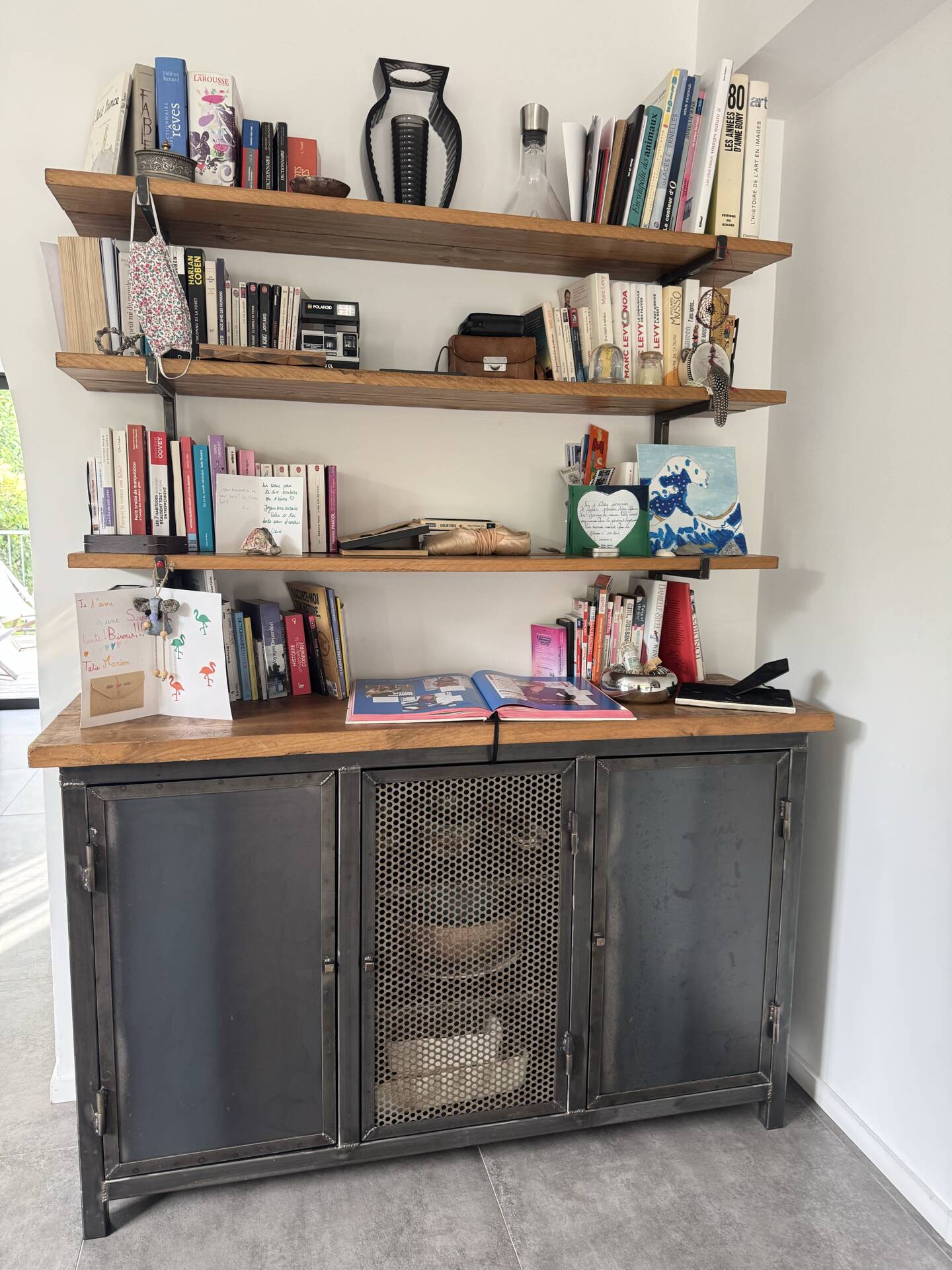 Metal and wood shelves and cupboards.