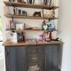 Metal and wood shelves and cupboards.