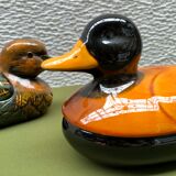 Enamelled terracotta boxes in the shape of ducks.