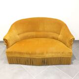 Velvet fringed sofa