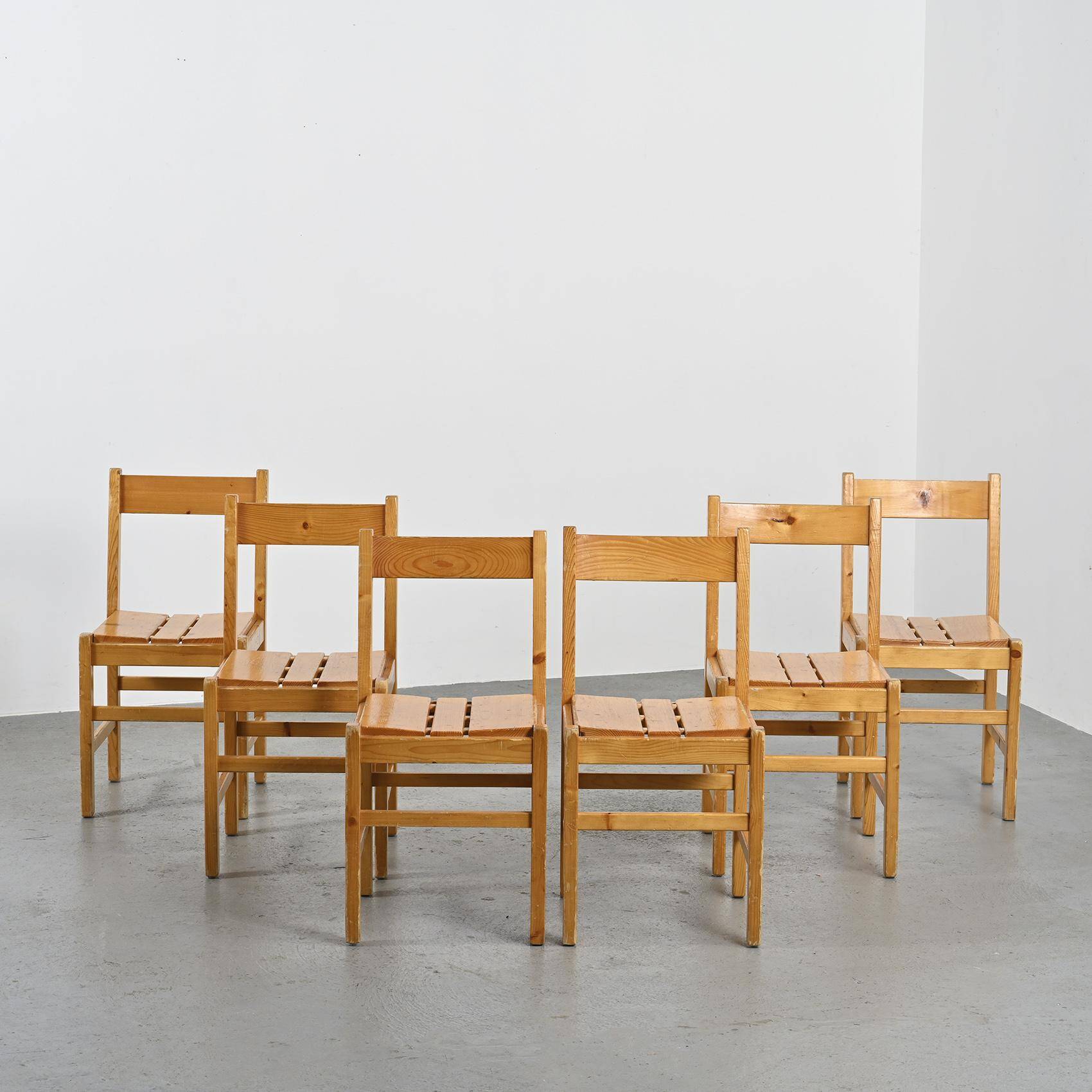 Set of six solid pine chairs by Maison Regain