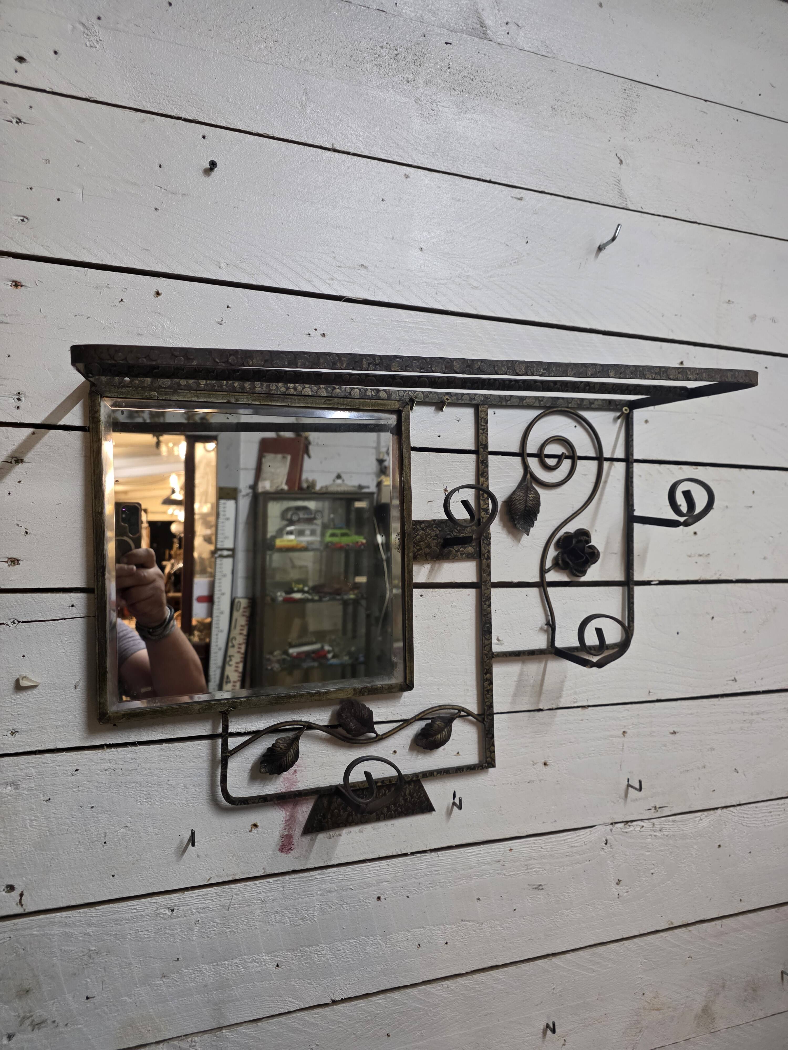 Art Deco coat rack in hammered wrought iron, 1950s.