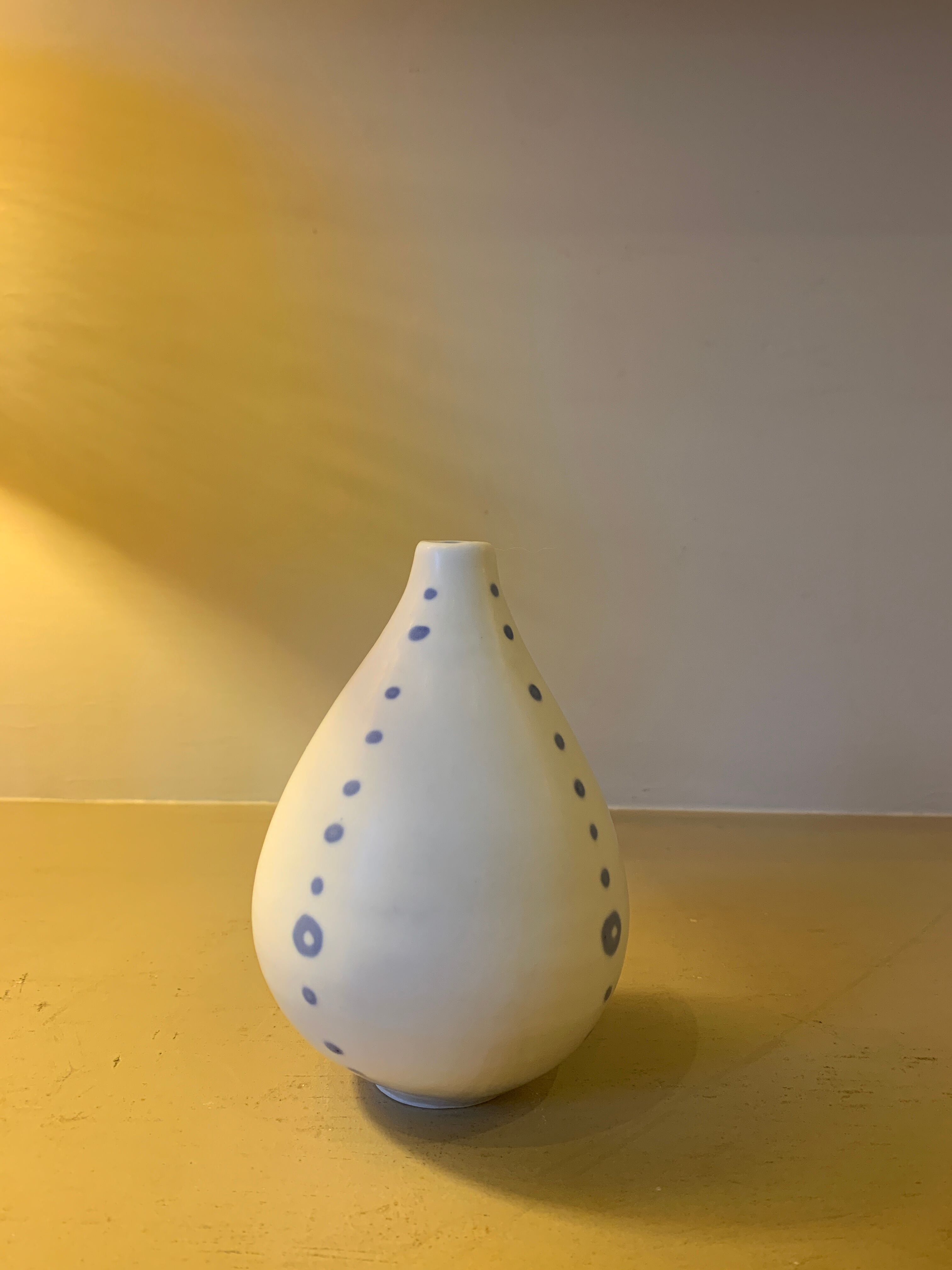 White ceramic with polka dots