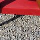 Fauteuil vintage des années 50 pieds compas moleskine rouge