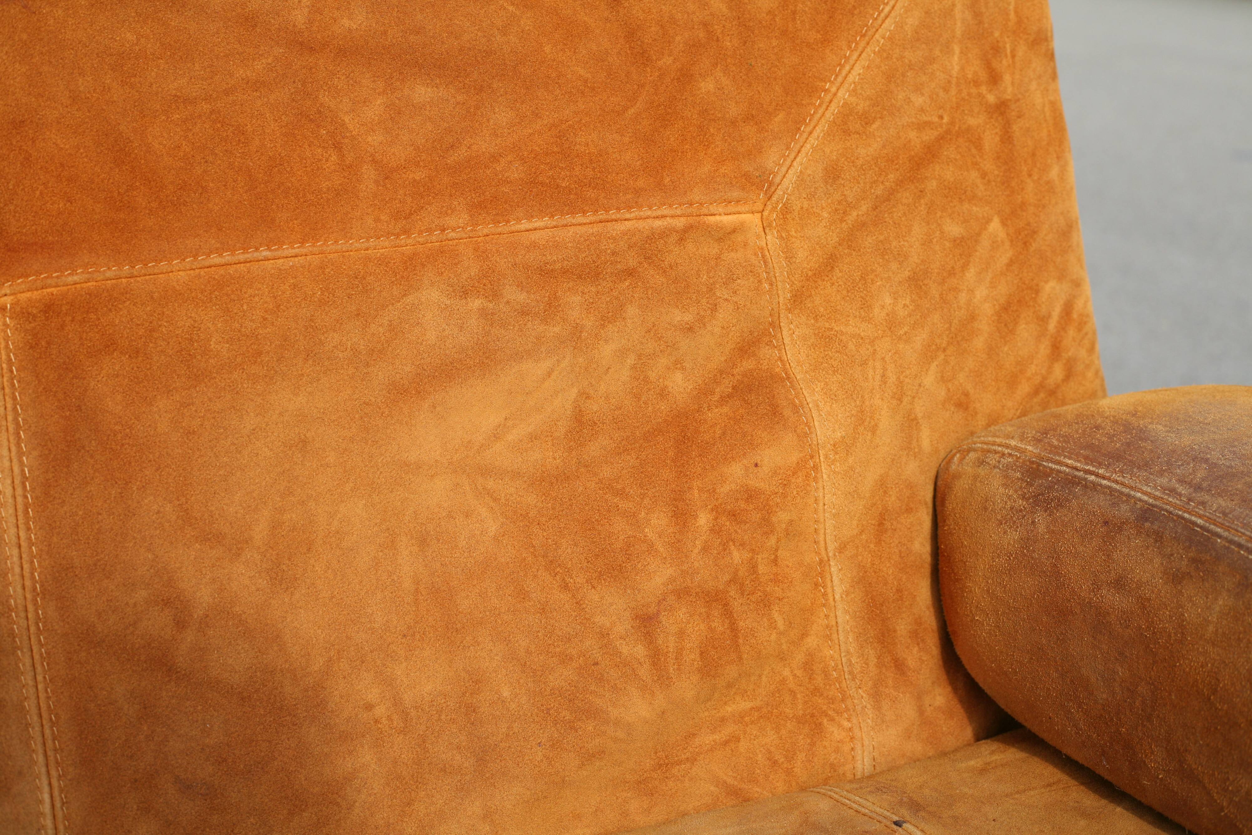 Orange suede leather and steel sofa. Circa 1970