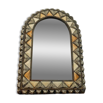 Oriental bone mirror