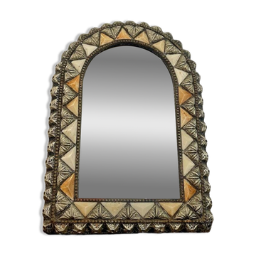 Oriental bone mirror