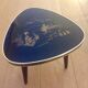 Table basse tripode pieds compas