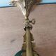 Wall light in bronze art nouveau with green opaline lampshades.