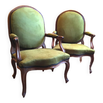 Pair of wide Louis XV armchairs reupholstered to new.