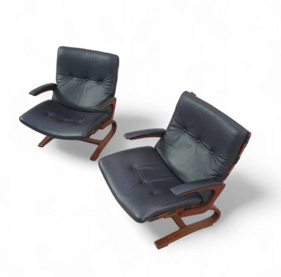 2 x leather lounge chairs