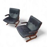 2 x leather lounge chairs