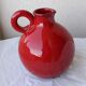 Red ceramic pitcher