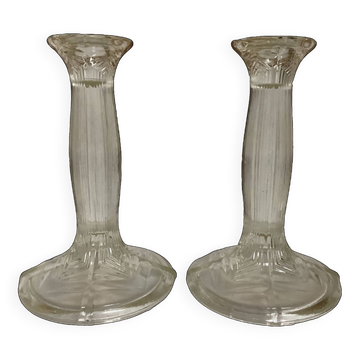 Pair of geometric Art Deco candlesticks made of moulded glass.