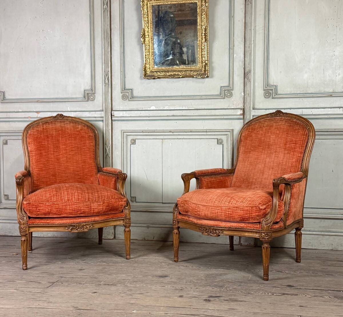 Pair of transitional carved wooden armchairs, 18th century