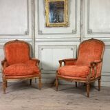 Pair of transitional carved wooden armchairs, 18th century
