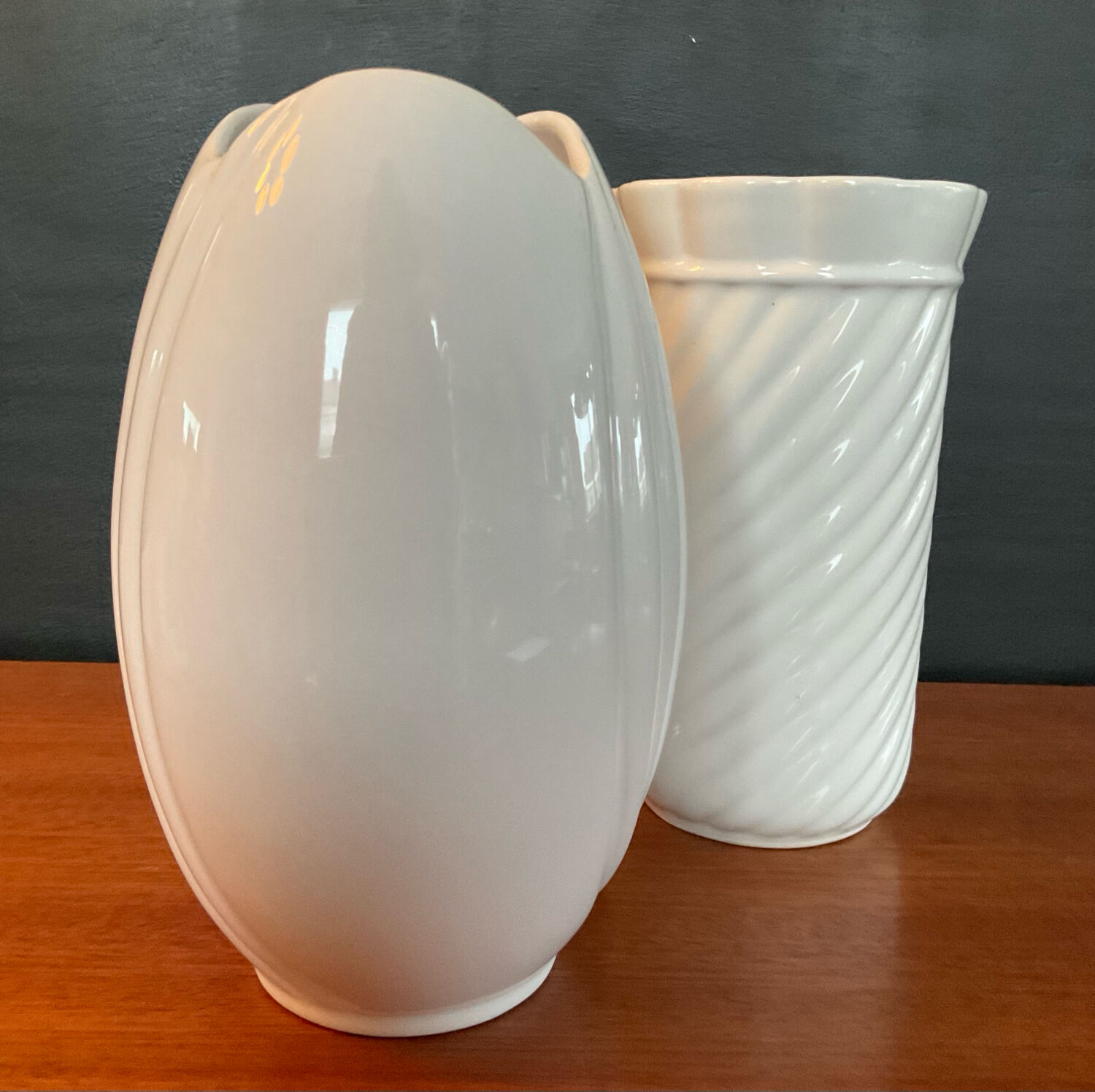 A pair of vintage ceramic vases from the 1970s.