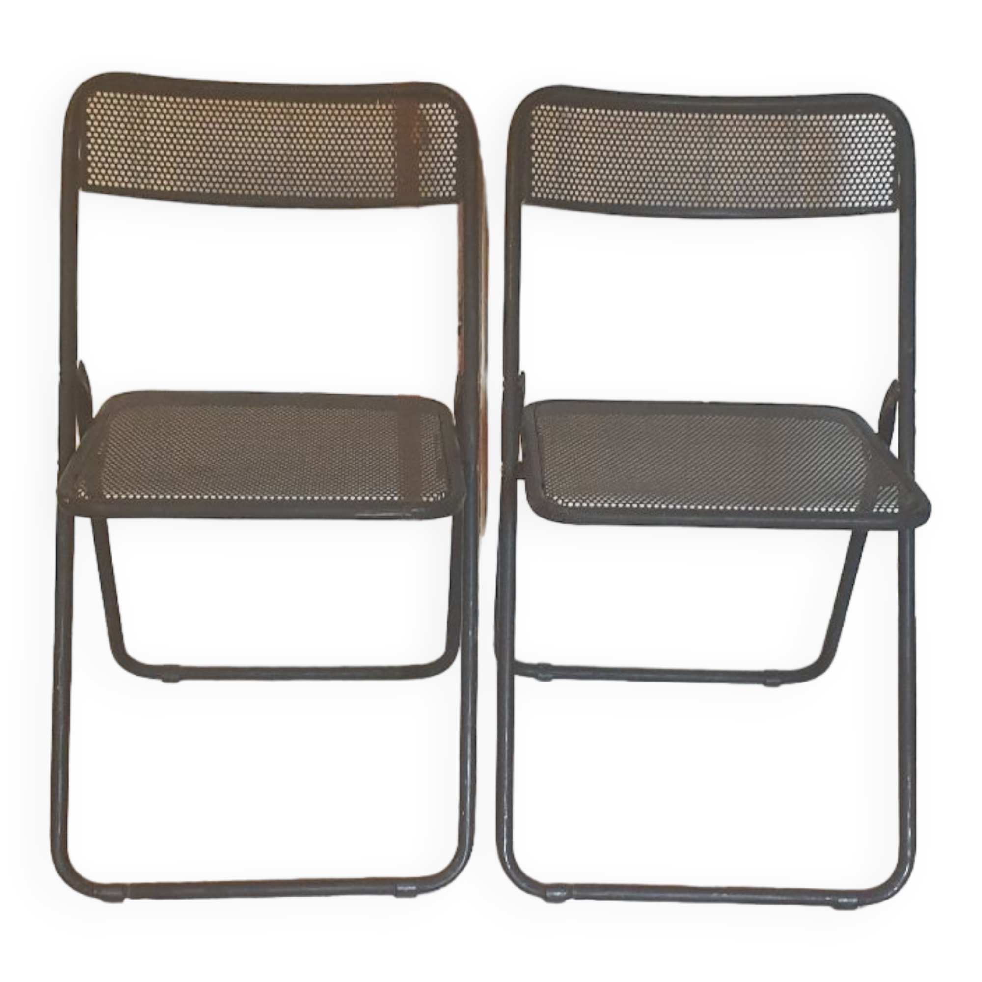 Pair of folding chairs in perforated metal