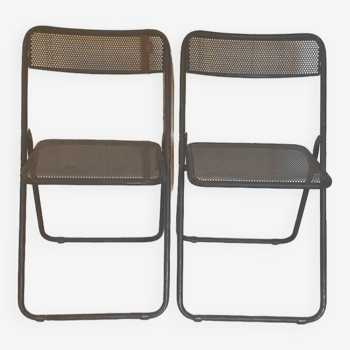 Pair of folding chairs in perforated metal