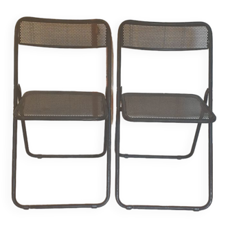 Pair of folding chairs in perforated metal