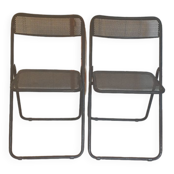 Pair of folding chairs in perforated metal