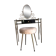 Brass hairdresser, glass and black plastic with its fluffy stool.