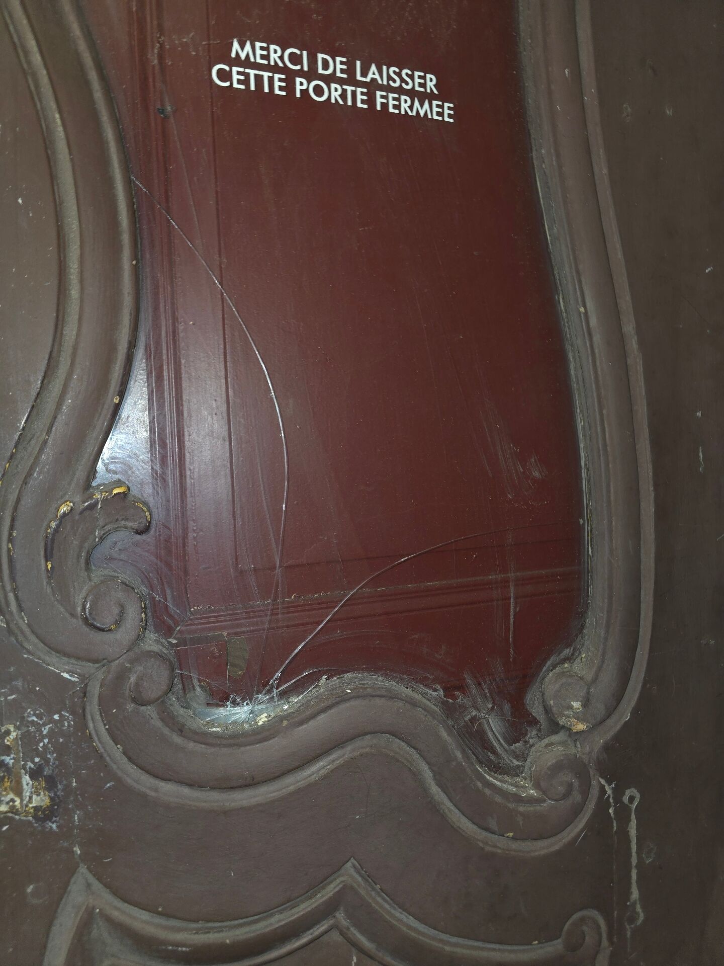 Old glass shop door in oak