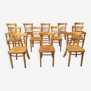 12 varnished bistro chairs