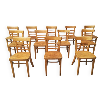 12 varnished bistro chairs