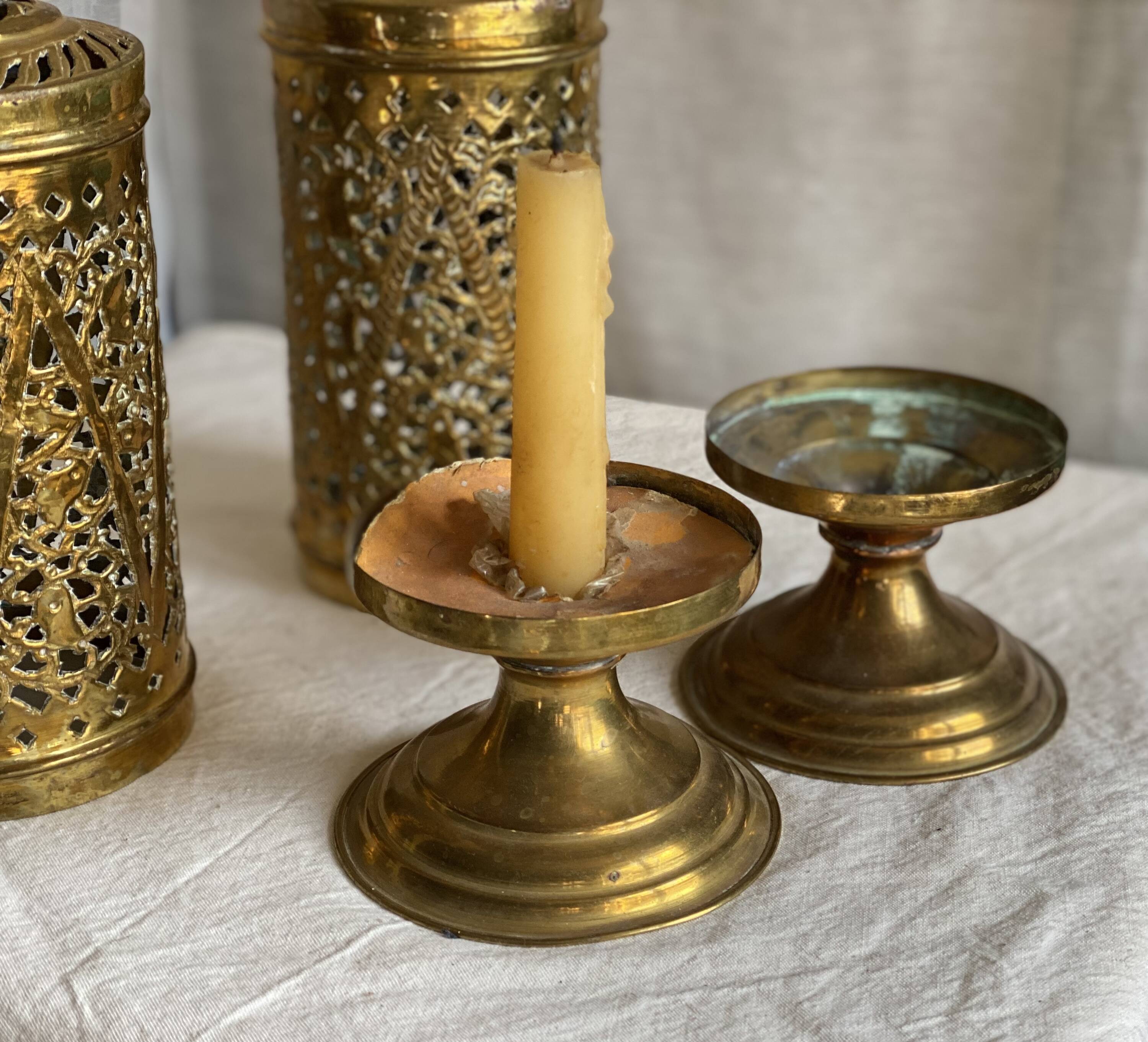 Pair of vintage openwork copper tealight candle holders