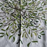 Hand-embroidered tablecloth on rectangular thread canvas