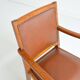 Antique brutalist oak and vinyl armchair