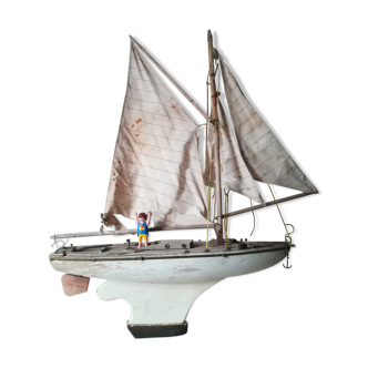 White pool sailboat