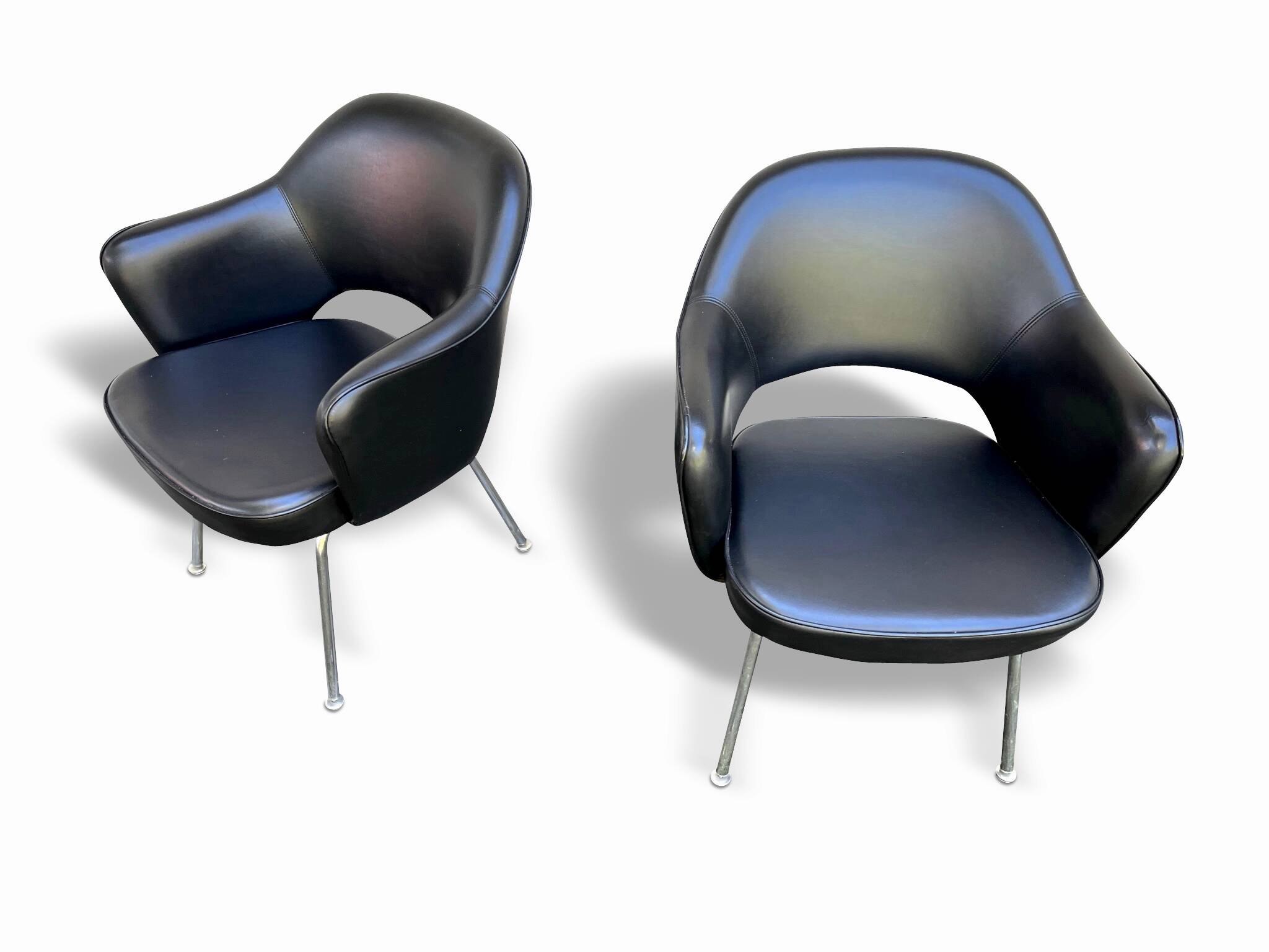 Pair of "Conference" armchairs by Eero Saarinen for Knoll International, black and chrome