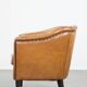 Sheep leather club chair finished with black piping