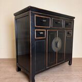 Chinese chest of drawers in black and gold lacquer