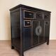 Chinese chest of drawers in black and gold lacquer