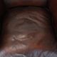 Set of two cow leather club armchairs in a luxurious red/brown colour