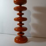 Vintage wooden candlestick turned orange