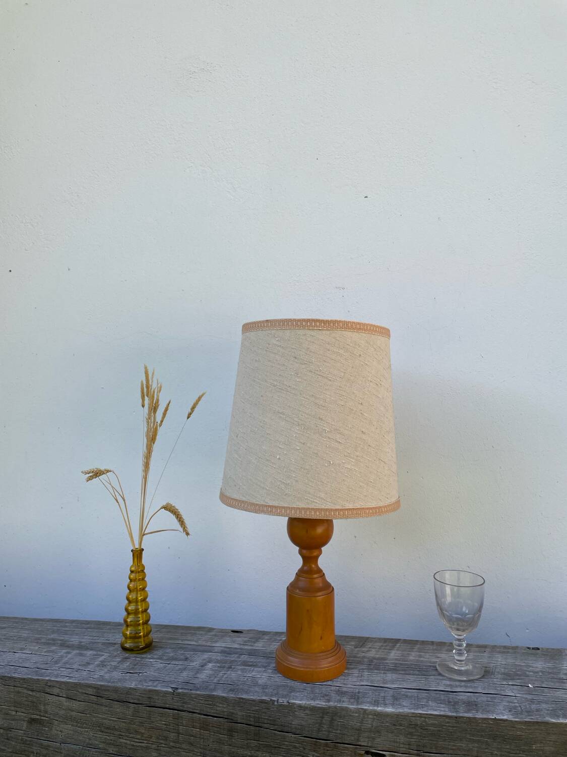 Old turned wooden lamp